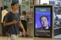 An ad by Valor media shows a photo of Elon Musk at a shopping center in Brasilia, Brazil, Monday, S…